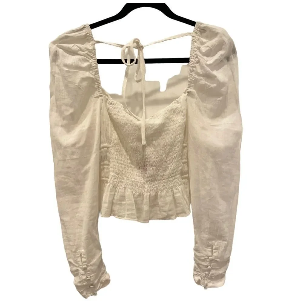 Free People Chloe puff sleeve blouse in white.Size M